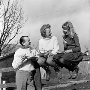 Actor John Mills, wife Mary Hayley Bell and their daughter Hayley Mills pictured out in