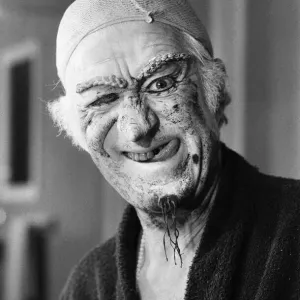 Actor John Pertwee in the dressing room being made up for his role as Wurzel Gummidge in