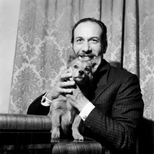 Actor Jose Ferrer and Corgi. August 1952 C4239 Actor Jose Ferrer and Corgi. August 1952 C4239