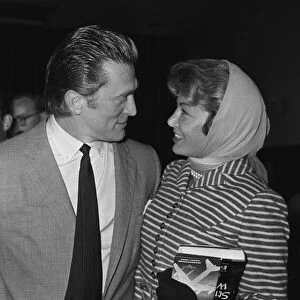 Actor Kirk Douglas at London Airport with his wife August 1958