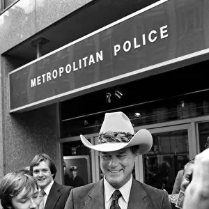 Actor Larry Hagman who plays J. R. Ewing in the programme Dallas seen here surrounded by