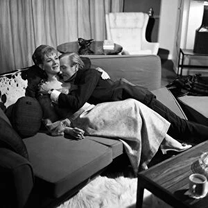 Actor Leslie Phillips and actress Barbara Murray on the set of "Some Will