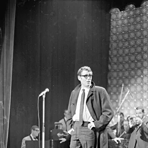 Actor Peter O Toole on stage at Stars Shine for Jack Hylton with an orchestra