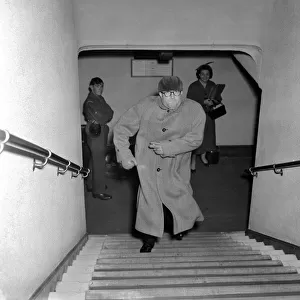 Actor Peter Sellers hurries upstairs of the Paris cinema in central London after his