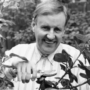 Actor Richard Briers seen here in the garden pruning roses at his West London home Actor Richard Briers seen here in the garden pruning roses at his West London home