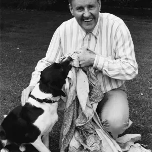 Actor Richard Briers seen here in the back garden of his West London home with his dog Actor Richard Briers seen here in the back garden of his West London home with his dog