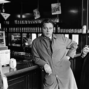 Actor Richard Burton pictured in a London pub during the filming of "