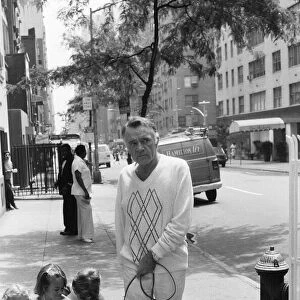 Actor Richard Burton out walking his dog near his New York Hotel