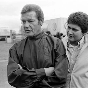 Actor Roger Moore on location at the RAF Upper Heyford, Oxon