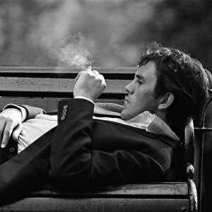 Actor Terence Stamp pictured in a park in London. 13th September 1962