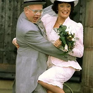 Actors Ken Morley and Sherrie Hewson as Reg Holdsworth and Maureen Naylor getting married
