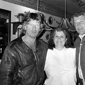 Actors Robin Askwith (left) and Gareth Hunt pictured with Francessca James at Giovannis
