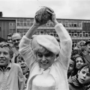 Actress Barbara Windsor was lucky on the coconut shy at The William Ellis School summer Actress Barbara Windsor was lucky on the coconut shy at The William Ellis School summer