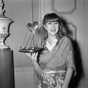 Actress Helen Mirren with her award at the Show Business Personality of 1975 as the best