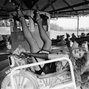 Actress Helen Mirren wearing a fishnet tights portraying character of fairground stripper Actress Helen Mirren wearing a fishnet tights portraying character of fairground stripper