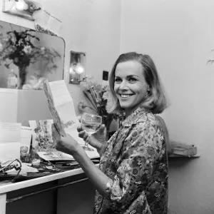 Actress Honor Blackman reads telegrams of congratulations in her dressing room Actress Honor Blackman reads telegrams of congratulations in her dressing room