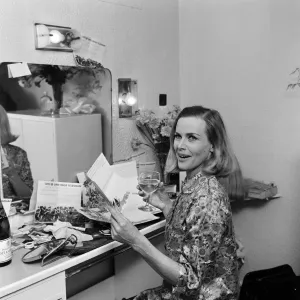 Actress Honor Blackman reads telegrams of congratulations in her dressing room Actress Honor Blackman reads telegrams of congratulations in her dressing room