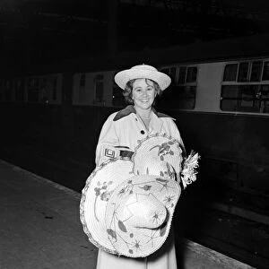 Actress Joan Plowright and her husband return from SAF. 3rd October 1952