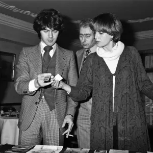 Actress Joanna Lumley judging a Purdey haircut lookalike contest with hairdresser John Actress Joanna Lumley judging a Purdey haircut lookalike contest with hairdresser John