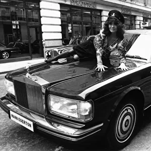 Actress Kate O Mara on the bonnet of a Rolls Royce October 1987 Of Dynasty