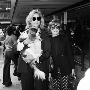 Actress Lauren Bacall at Heathrow Airport with her son Sam (12)