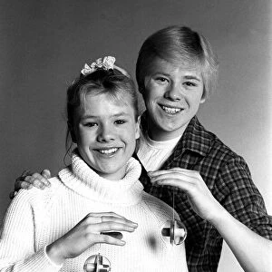 Actress Letitia Dean with brother Stephen try out new yo yos. January 1982