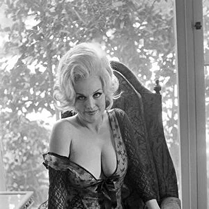 Actress Liz Renay poses for pictures wearing underwear. November 1969 Z11089-005