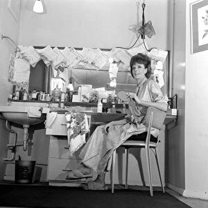 Actress Maggie Smith in her dressing room April 1963