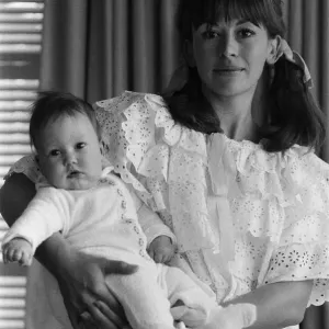 Nanette Newman with 4-month-old daughter Emma in Virginia Water Print Nanette Newman with 4-month-old daughter Emma in Virginia Water Print