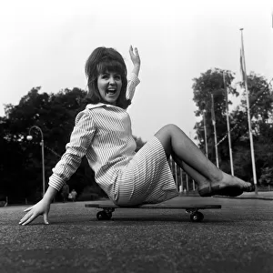 Actress Pauline Collins goes skateboarding. 4th June 1965
