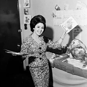 Actress and singer Susan Maughan, celebrates her 21st birthday in her dressing room at