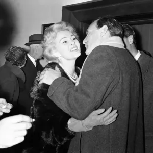 Actress Zsa Zsa Gabor & actor Trevor Howard greet one another on arrival at London Actress Zsa Zsa Gabor & actor Trevor Howard greet one another on arrival at London