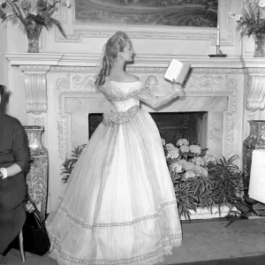 Actresses and models take part in a 18th century fashion parade at Pinewood Studios