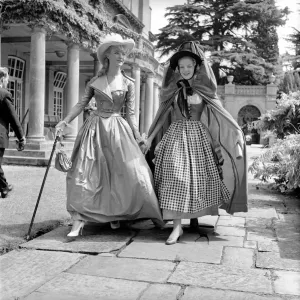 Actresses and models take part in a 18th century fashion parade at Pinewood Studios