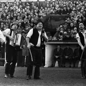 Adge Cutler and The Wurzels perform before the fans at the Bristol City ground
