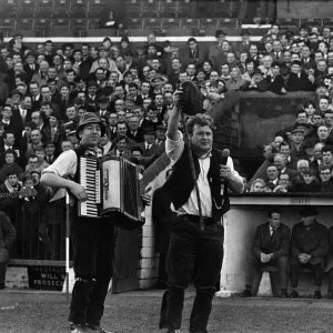 Adge Cutler and The Wurzels perform before the fans at the Bristol City ground