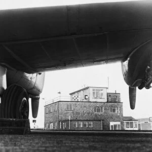 The administrative buildings at Swansea airport seen here framed in the engine of one of