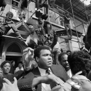 Muhammad Ali Surprises Mrs. Chris Kotuiski in 1983 Print Muhammad Ali Surprises Mrs. Chris Kotuiski in 1983 Print