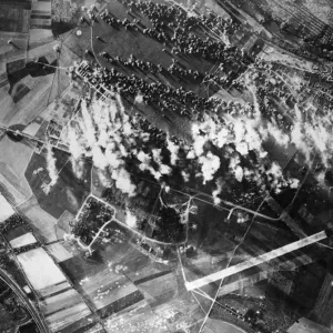 Aerial view of B17 Flying Fortress bombers of the US 8th Air Force plastering another