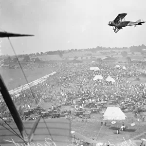 Aerial view of Hendon Air Pageant as a RAF Bristol F. 2 Fighter over flies the crowd