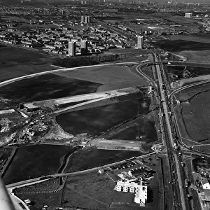 Aerial view of M57 Motorway, The East Lancashire Road is seen (right