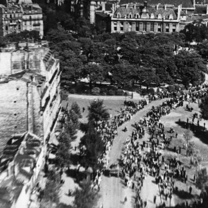 Aerial view showing the rejoicing crowds on the streets of Paris as they greet the entry Aerial view showing the rejoicing crowds on the streets of Paris as they greet the entry