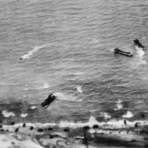An aerial view of the storming of Beach Head in the great allied attack on the French An aerial view of the storming of Beach Head in the great allied attack on the French