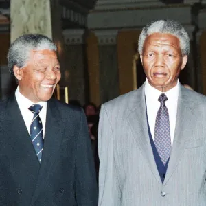 African National Congress leader Nelson Mandela seen here posing beside his wax work African National Congress leader Nelson Mandela seen here posing beside his wax work