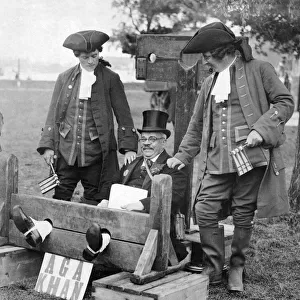 The "Aga Khan"in the stocks with attendants. Lowestoft, Suffolk. July 1930