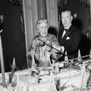 Agatha Christie cuts cake with sword 1962 at 10th anniversary of the play Mousetrap Agatha Christie cuts cake with sword 1962 at 10th anniversary of the play Mousetrap