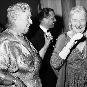 Agatha Christie and Dame Sybil Thorndyke laughing 1962 at 10th anniversary of