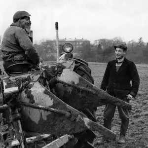 Agriculture: Farming: Ploughing Mr. Giles Tedstone (31) - on tractor-manager of