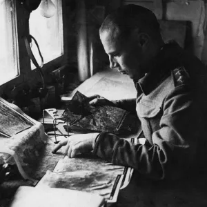 Air Army photographic interpretation unit with 8th army. (Picture) Captain A