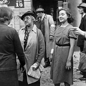 Air Raid Victims of the Blitz, London. The girl being led away is Miss J W Stokes